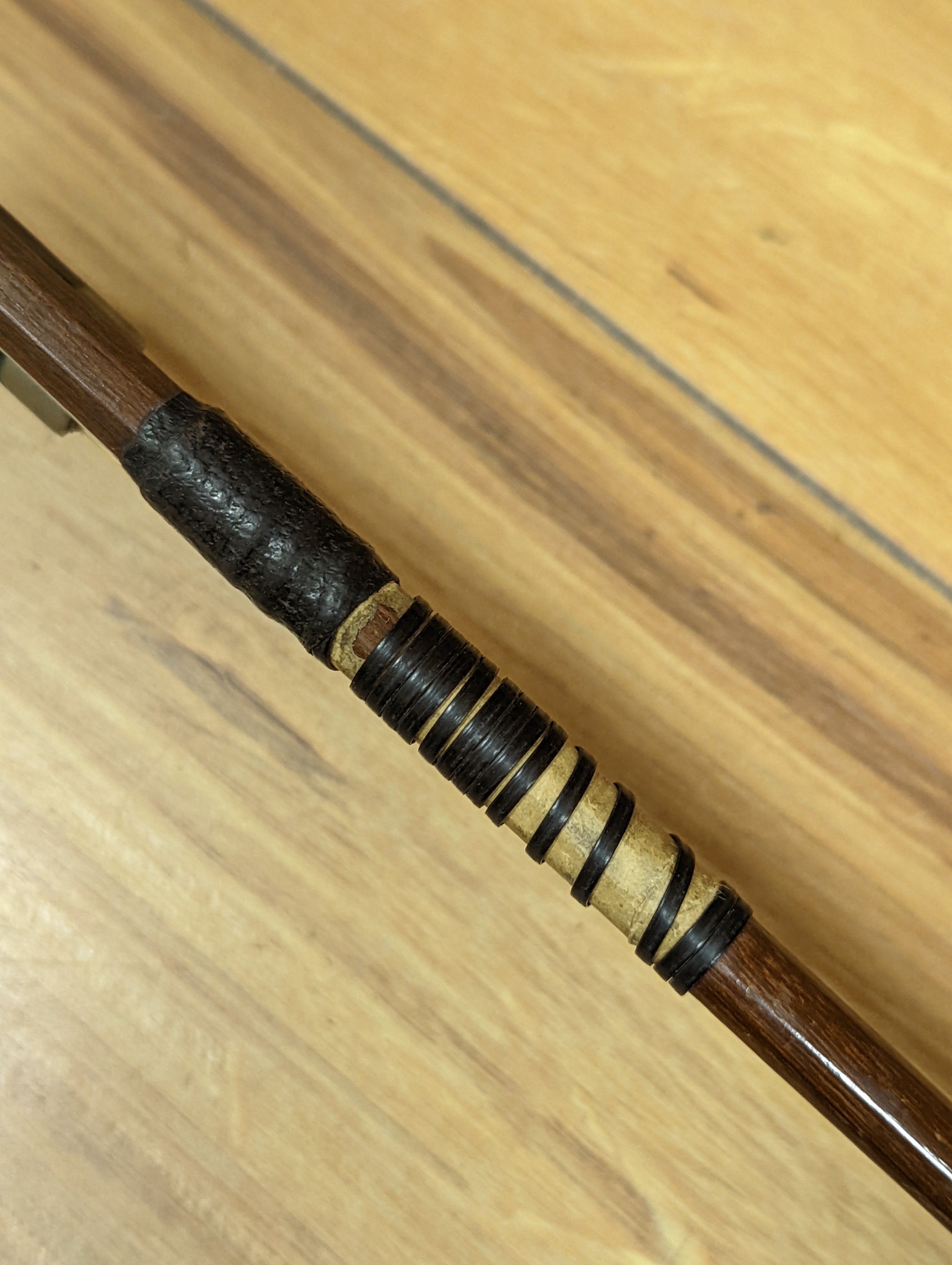 An early 20th century French vioilin, cased with bow and a cased saxon violin
